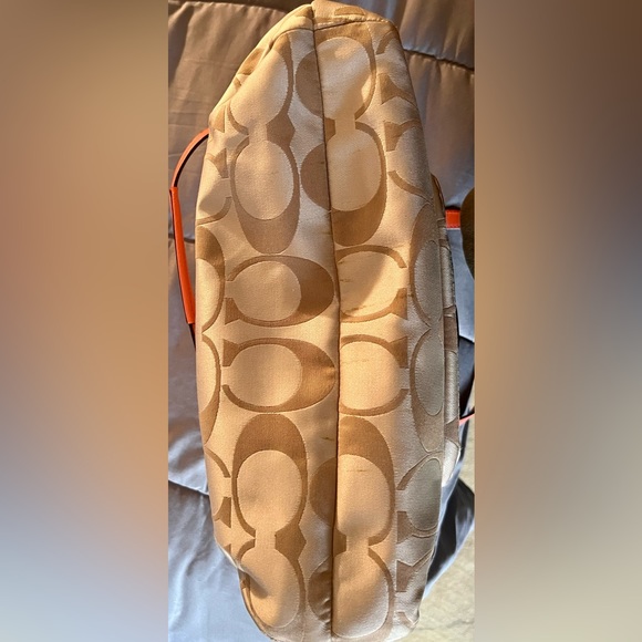 Medium coral and tan Coach bag. Used for 1 night. Basically new! Serial number - Picture 7 of 10